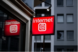 The street sign of an internet cafe.